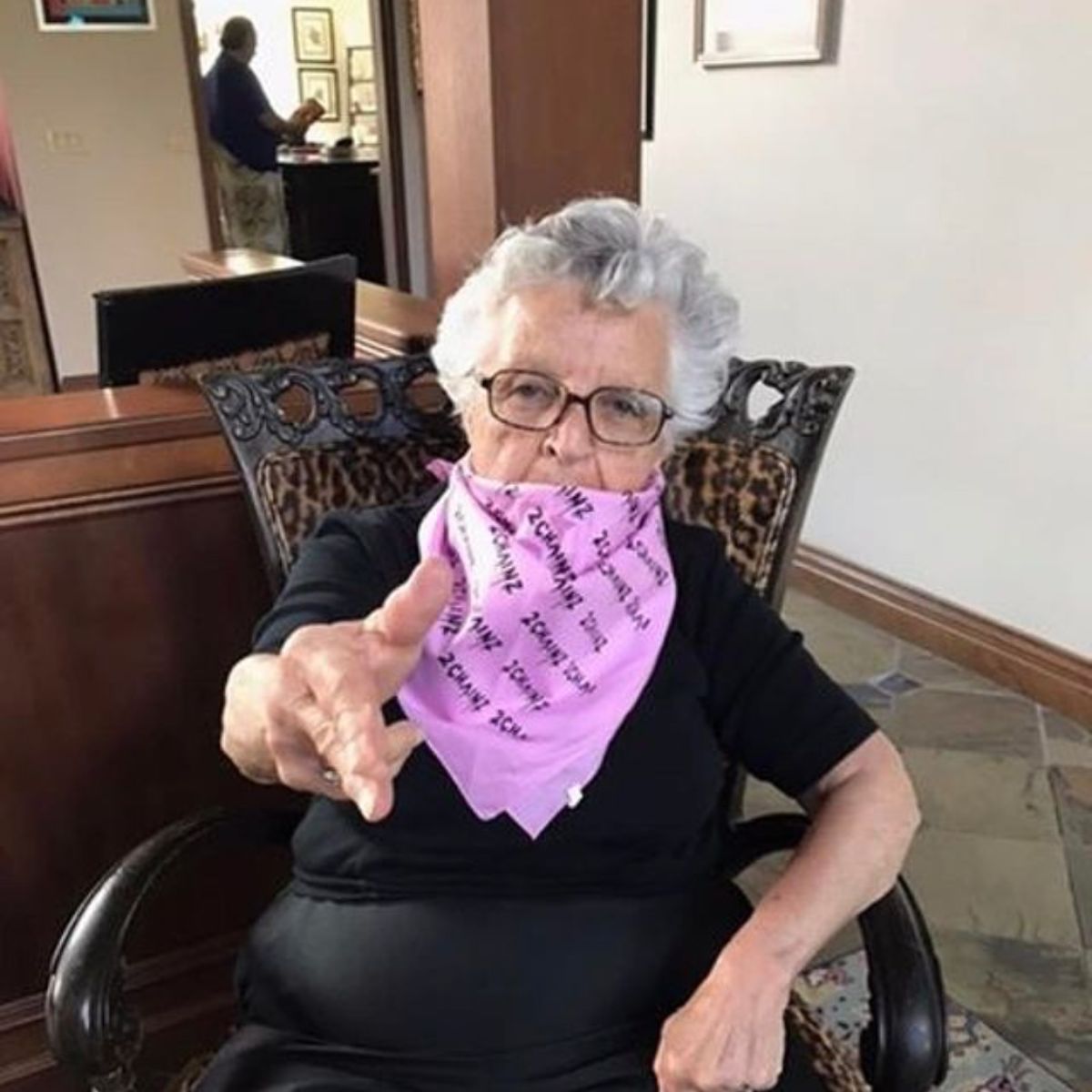 Photo of Adam Pally's grandmother, Sylvia showing a gun sign